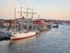 This is a 100 year old Danish ship that sailed around the world trading. It is now used as a hotel and restaurant.