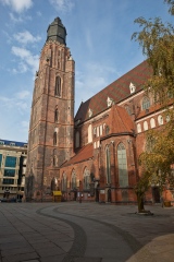 In Wroc?aw (Breslau in German), Poland, St. Elizabeth's Church was 130 meter high when built. The gothic structure dates back to the 14th century when building was assigned by the city of Breslau. It was destroyed by a heavy hail in 1529 and suffered damage by fire in 1976. During this unfortunate event, the church's renowned organs went up in flames. Its main tower is now only 91 meters high.