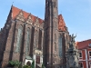 Church of the Holy Cross. Actually there are two churches in one building, the other being St. Bartholomew\'s each having a separate main hall.  Monument of John of Nepomuk.