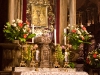 Inside St. John the Baptist Cathedral while walking past a golden portrait of Mary she always seems to be looking at you no matter where you stand.