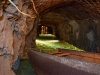 Looking down one of the tunnels with water.