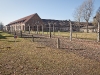 Looking back at the fence after walking into the front gate of Auschwitz.