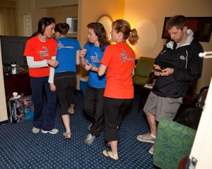 Rain on Monday morning delayed the start of the meet.  Here SDC Furies (Anabel, Karyn, Rhonda, and Shannon) practice at the motel while coach Brian Johnson checks on the meet status.