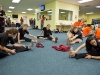 Day 2 of the 2009 USPA Nationals stretching before the first jump of the day in the packing room which had some air conditioning.