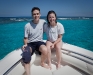 Chad and Rhonda in the front of the boat near the reef.