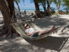 Rhonda relaxing on a hammock at Rum Point beach.