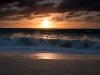 Grand Cayman sunset with large waves.